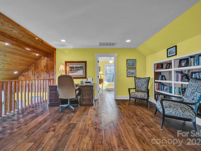 146 Sarinac Drive, Bostic, NC 28018.  MLS# CAR4327091, YatesRealty ID 844. 2nd floor loft ideal for office or play space with built-in book cases