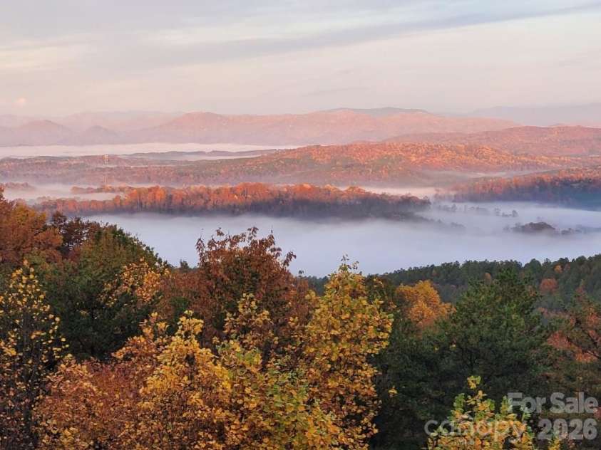 146 Sarinac Drive, Bostic, NC 28018.  MLS# CAR4327091, YatesRealty ID 844. Expansive western mountain views, beautiful in the summer, fall, winter, and spring
