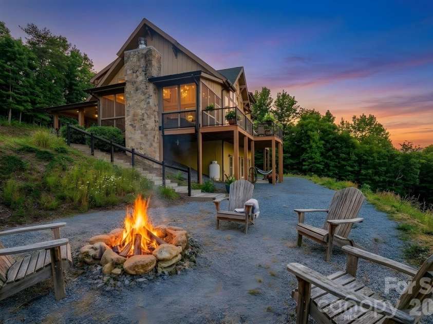 146 Sarinac Drive, Bostic, NC 28018.  MLS# CAR4327091, YatesRealty ID 844. Fire pit perfect for summer time s'mores and cozy evenings