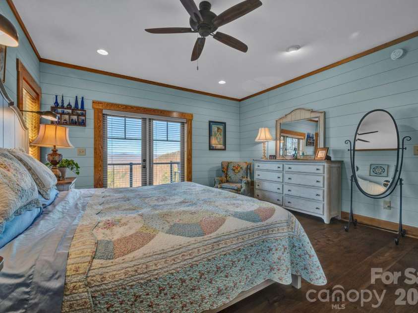 146 Sarinac Drive, Bostic, NC 28018.  MLS# CAR4327091, YatesRealty ID 844. First floor primary bedroom with direct deck access