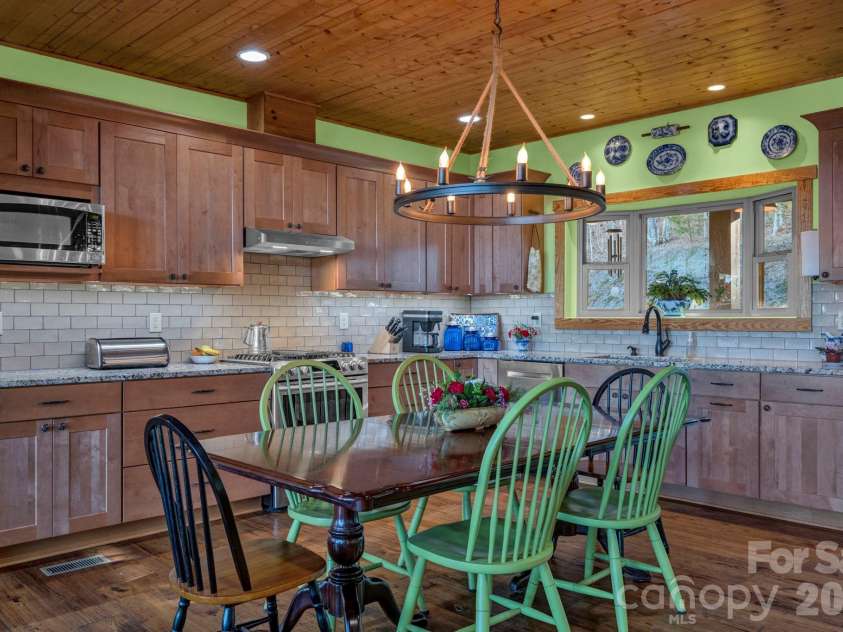 146 Sarinac Drive, Bostic, NC 28018.  MLS# CAR4327091, YatesRealty ID 844. Kitchen with open floorplan to dining area