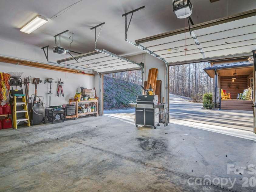 146 Sarinac Drive, Bostic, NC 28018.  MLS# CAR4327091, YatesRealty ID 844. Large 2 car garage with workshop area