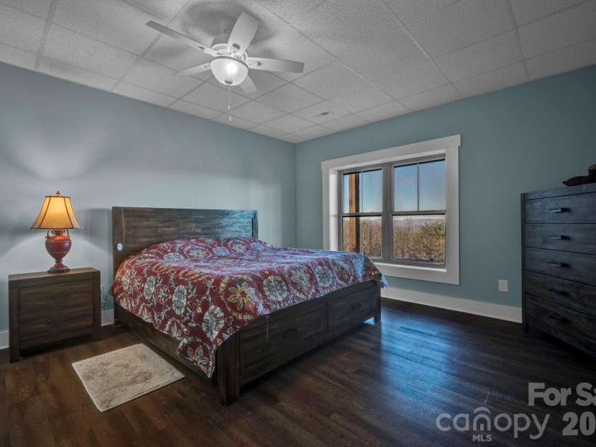 146 Sarinac Drive, Bostic, NC 28018.  MLS# CAR4327091, YatesRealty ID 844. Lower level bedroom with ceiling fan