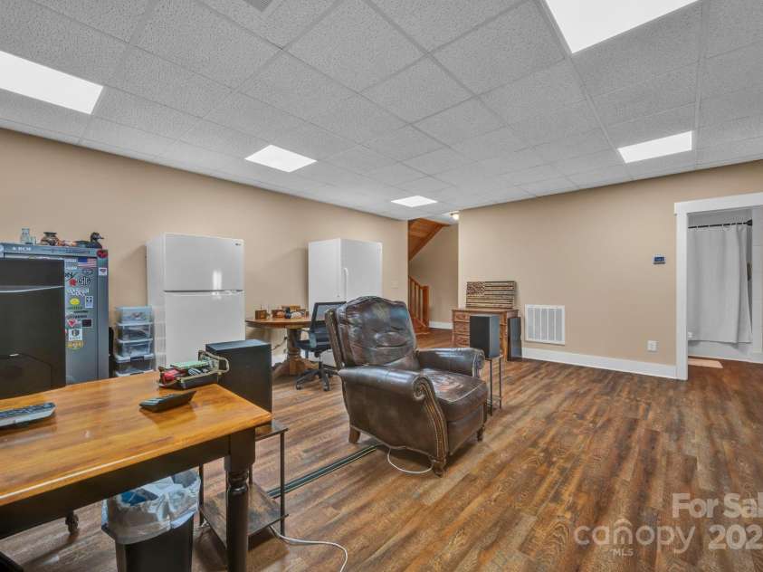 146 Sarinac Drive, Bostic, NC 28018.  MLS# CAR4327091, YatesRealty ID 844. Lower level offers two large flex spaces ideal for billiards, hobbies or family room