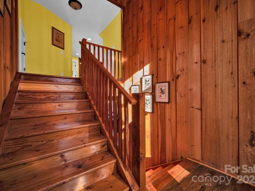 146 Sarinac Drive, Bostic, NC 28018.  MLS# CAR4327091, YatesRealty ID 844. Stained Douglas Fir stair case with landing