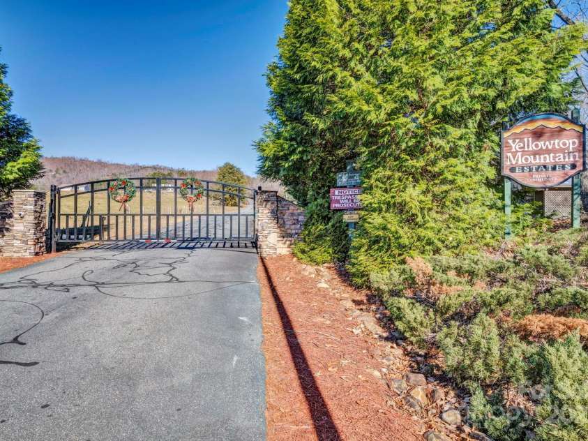 146 Sarinac Drive, Bostic, NC 28018.  MLS# CAR4327091, YatesRealty ID 844. Yellowtop Mountain Estates Gated Community Entrance