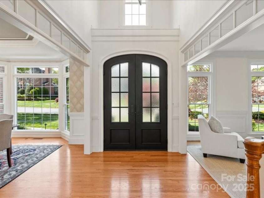 5809 Woodleigh Oaks Drive, Charlotte, NC 28226.  MLS# CAR4248176, YatesRealty ID 8441. Gorgeous iron French Front Doors with opaque glass privacy panels