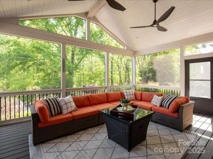 5809 Woodleigh Oaks Drive, Charlotte, NC 28226.  MLS# CAR4248176, YatesRealty ID 8441. Large screened-in porch with high bead-board ceiling and (3) different entry access doors...