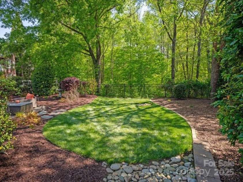 5809 Woodleigh Oaks Drive, Charlotte, NC 28226.  MLS# CAR4248176, YatesRealty ID 8441. Private grassy area for serenity or play equipment