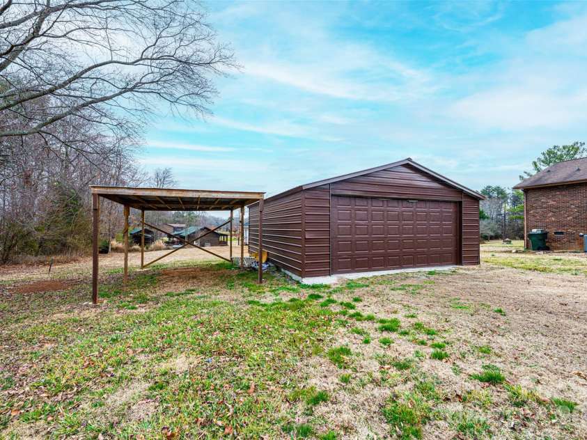 7141 Knobs Landing, Connelly Springs, NC 28612.  MLS# CAR4353694, YatesRealty ID 8442. Outbuilding and Carport
