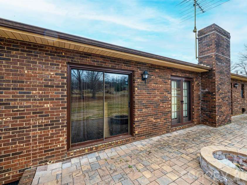7141 Knobs Landing, Connelly Springs, NC 28612.  MLS# CAR4353694, YatesRealty ID 8442. Sliding door to Primary Bedroom