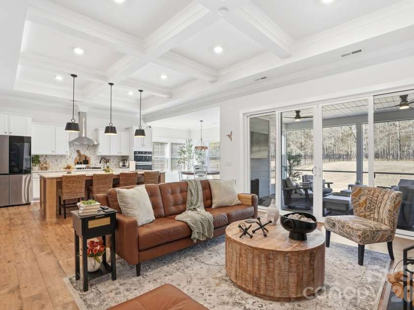 1342 Links Crossing Drive, Monroe, NC 28112.  MLS# CAR4341634, YatesRealty ID 8443. Coffered Ceiling in Living Room