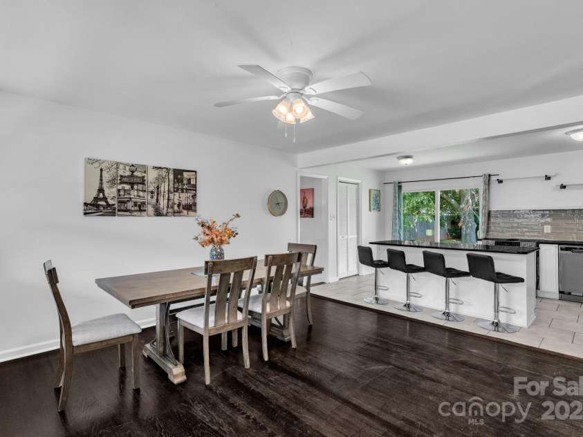 4930 Crestmont Drive, Charlotte, NC 28205.  MLS# CAR4276019, YatesRealty ID 8443. Living Opens to Kitchen