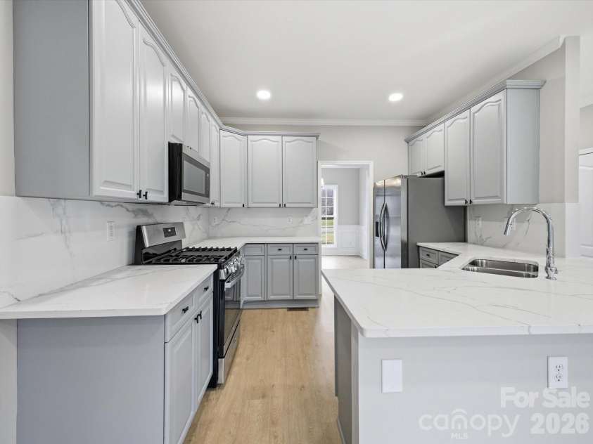 9701 Julliard Drive, Mint Hill, NC 28227.  MLS# CAR4344353, YatesRealty ID 8444. Kitchen 