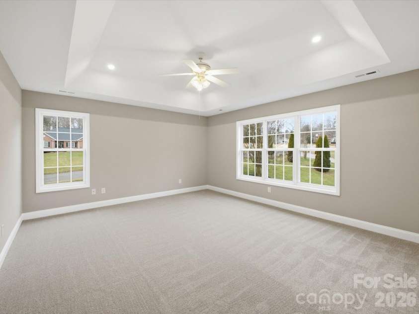 9701 Julliard Drive, Mint Hill, NC 28227.  MLS# CAR4344353, YatesRealty ID 8444. Primary Bedroom w/Trey Ceiling 