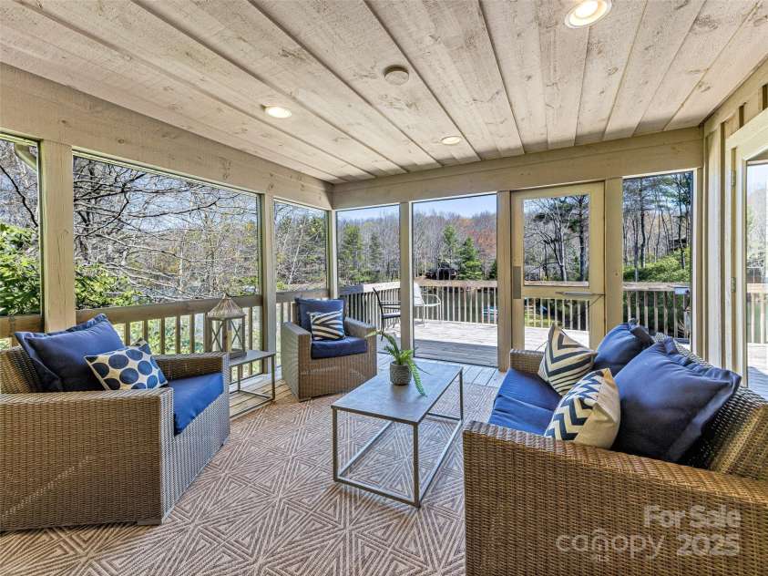 46 Kassahola Drive, Brevard, NC 28712.  MLS# CAR4238567, YatesRealty ID 8446. Screen Porch