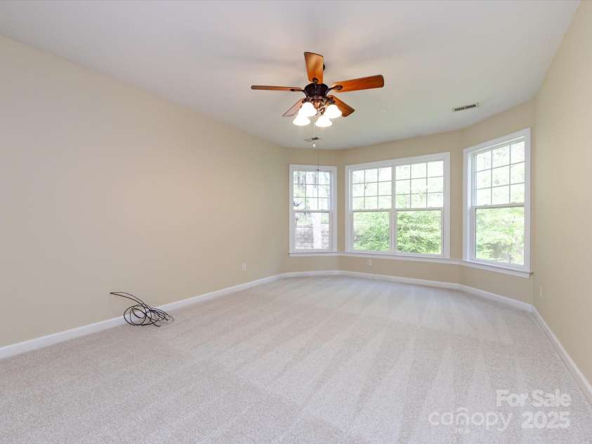 8830 Beaver Creek Drive, Charlotte, NC 28269.  MLS# CAR4233307, YatesRealty ID 8449. Large primary bedroom