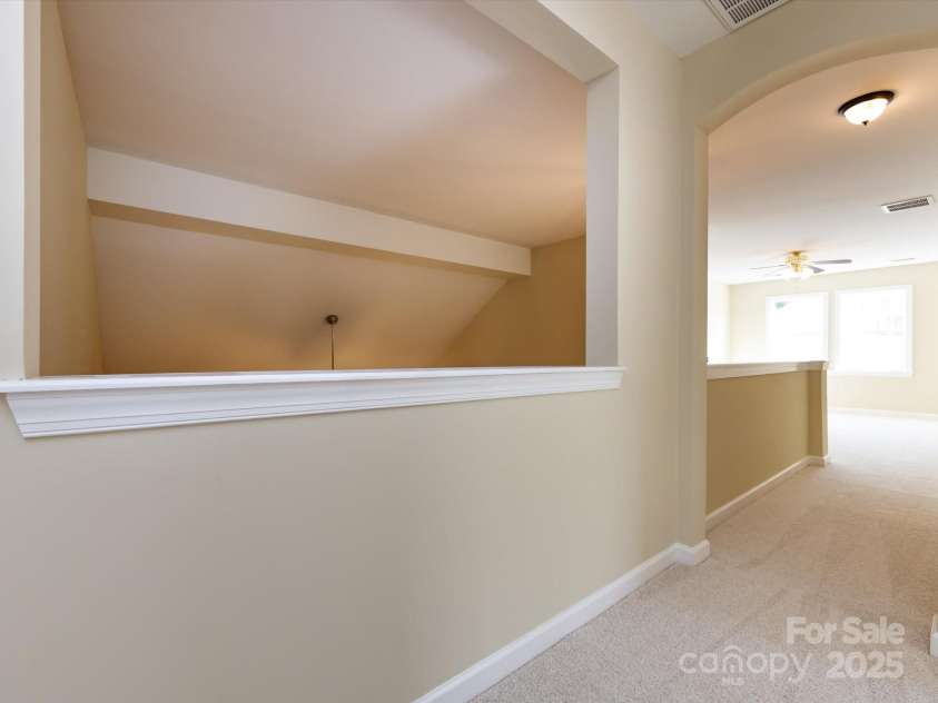 8830 Beaver Creek Drive, Charlotte, NC 28269.  MLS# CAR4233307, YatesRealty ID 8449. Open space on second floor
