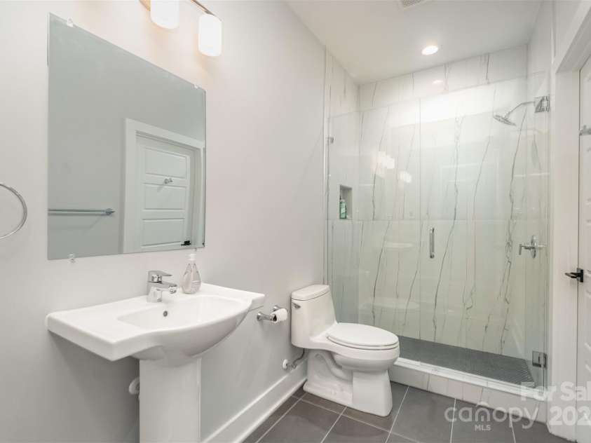 21205 Olde Quarry Lane, Cornelius, NC 28031.  MLS# CAR4198021, YatesRealty ID 8450. En suite bathroom for bedroom three.