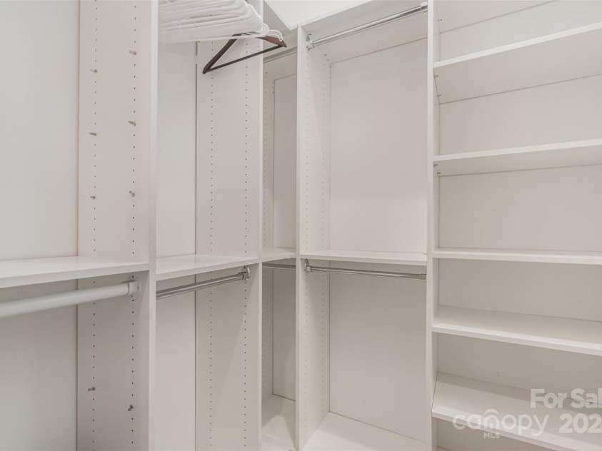 21205 Olde Quarry Lane, Cornelius, NC 28031.  MLS# CAR4198021, YatesRealty ID 8450. Primary custom closet number two.
