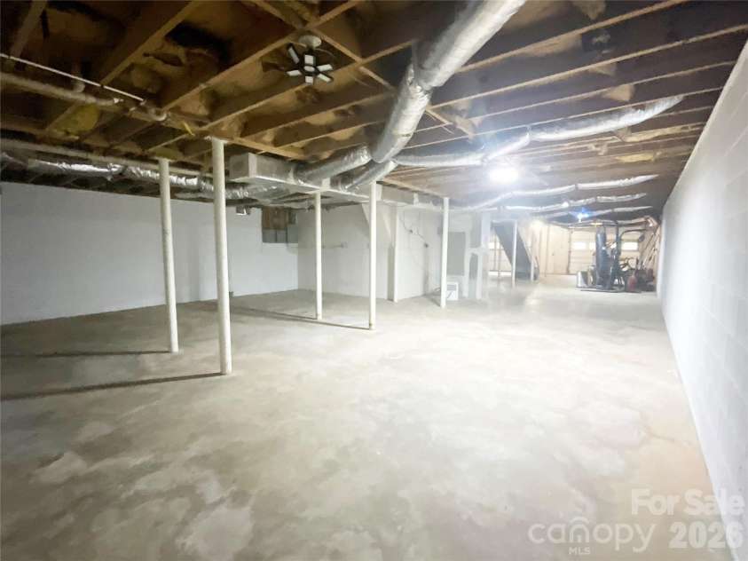 328 Melody Lane, Saluda, NC 28773.  MLS# CAR4282842, YatesRealty ID 8455. Basement