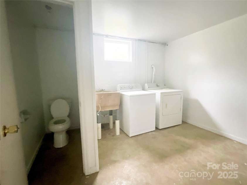 328 Melody Lane, Saluda, NC 28773.  MLS# CAR4282842, YatesRealty ID 8455. Laundry room in basement