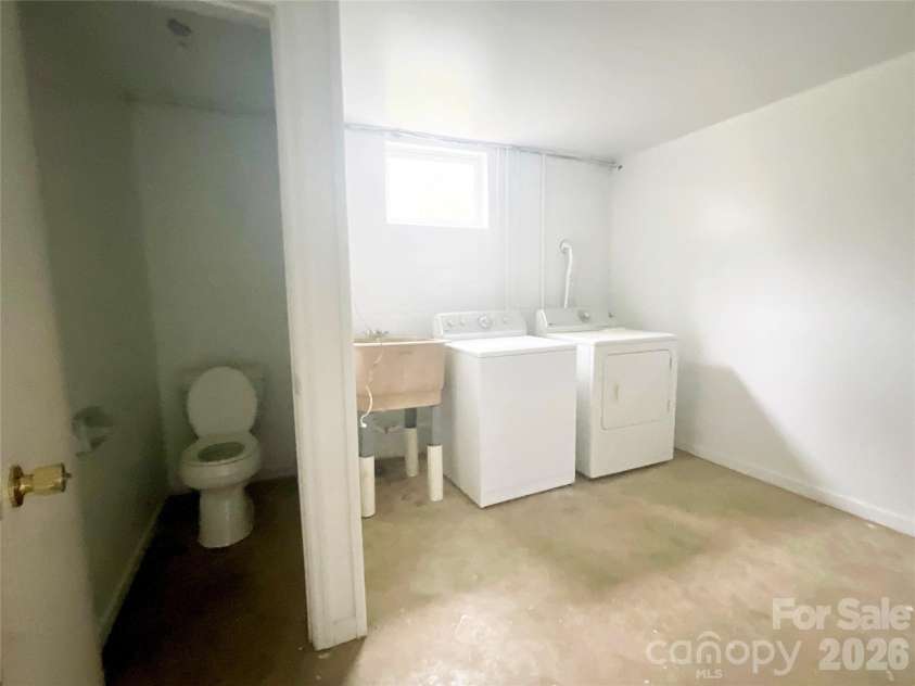 328 Melody Lane, Saluda, NC 28773.  MLS# CAR4282842, YatesRealty ID 8455. Laundry room in basement