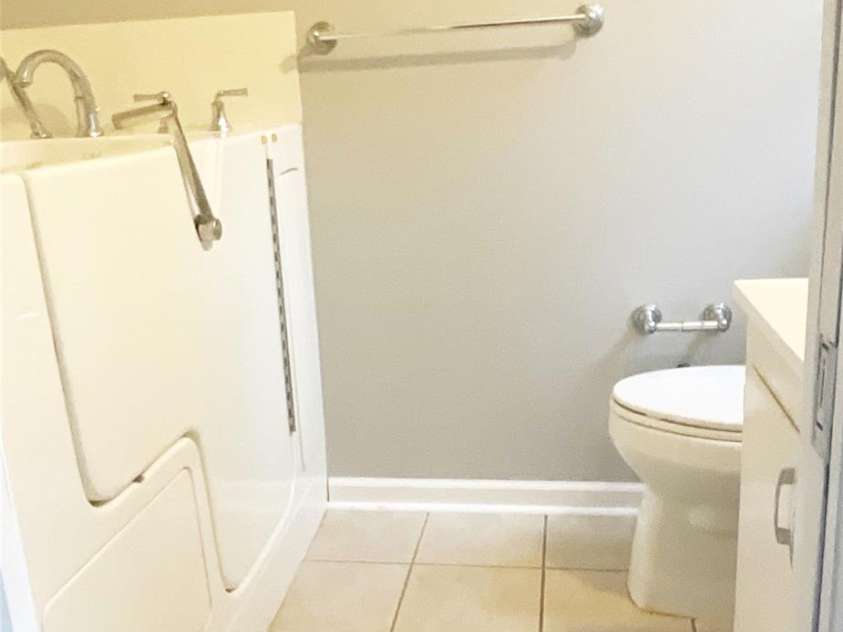 328 Melody Lane, Saluda, NC 28773.  MLS# CAR4282842, YatesRealty ID 8455. Master bath with walk in tub