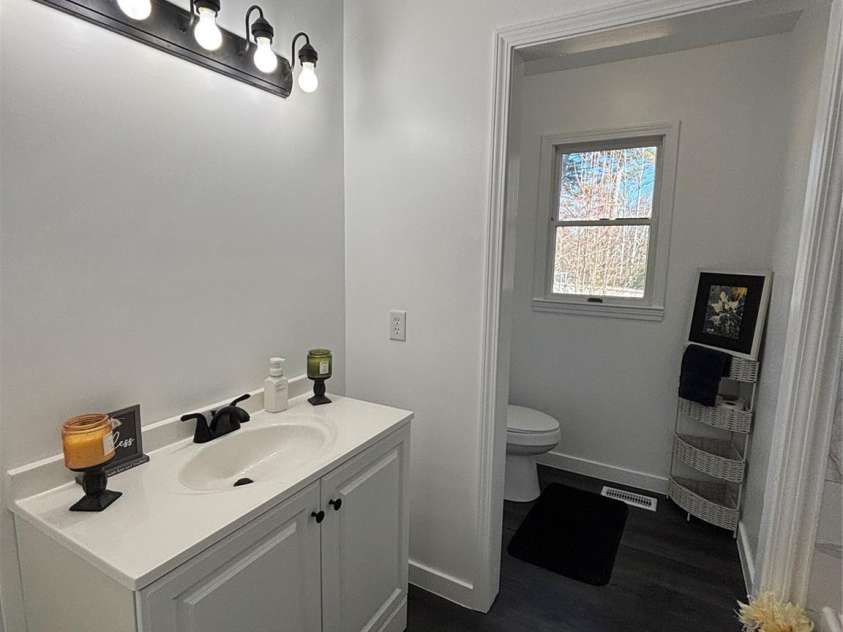 328 Melody Lane, Saluda, NC 28773.  MLS# CAR4282842, YatesRealty ID 8455. Updated hall Bath