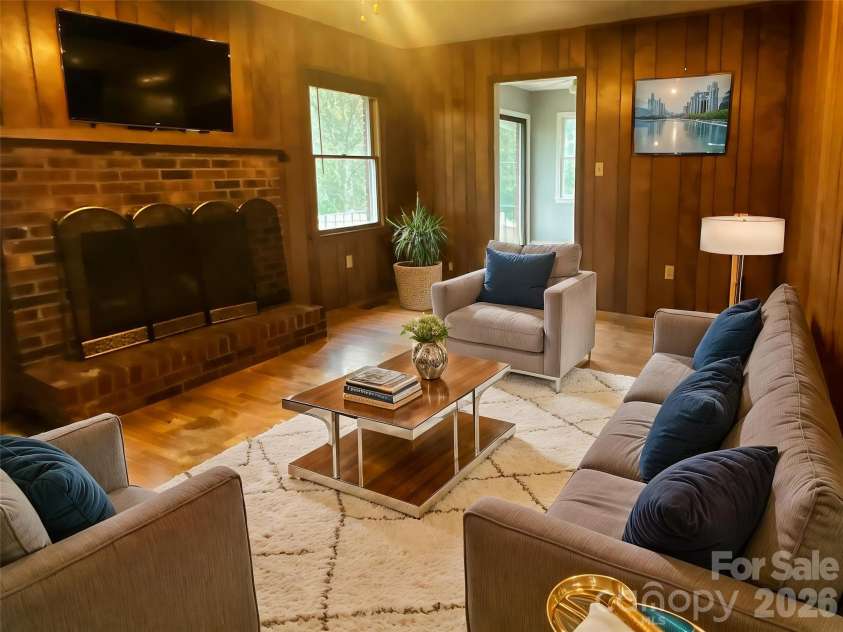 328 Melody Lane, Saluda, NC 28773.  MLS# CAR4282842, YatesRealty ID 8455. Virtually staged for family room