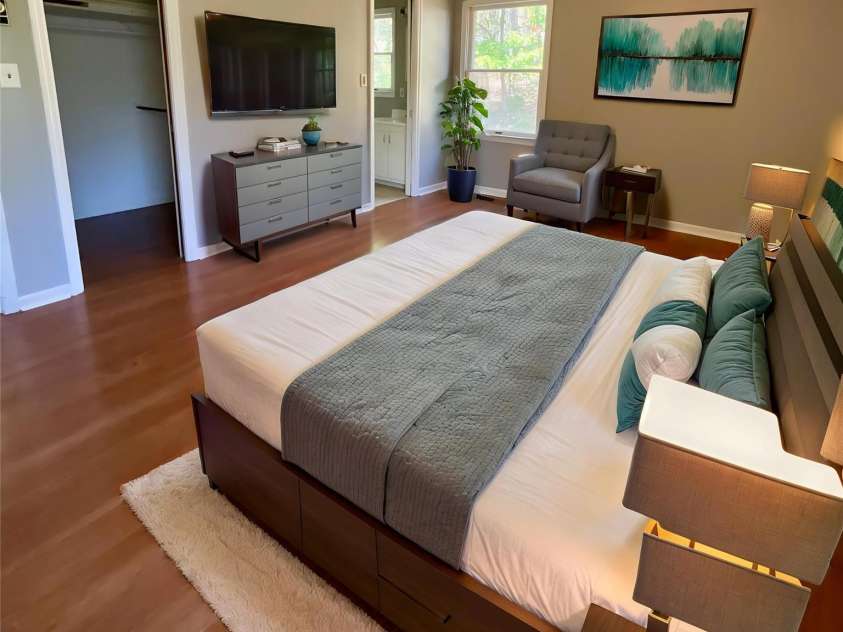 328 Melody Lane, Saluda, NC 28773.  MLS# CAR4282842, YatesRealty ID 8455. Virtually staged Master bedroom 