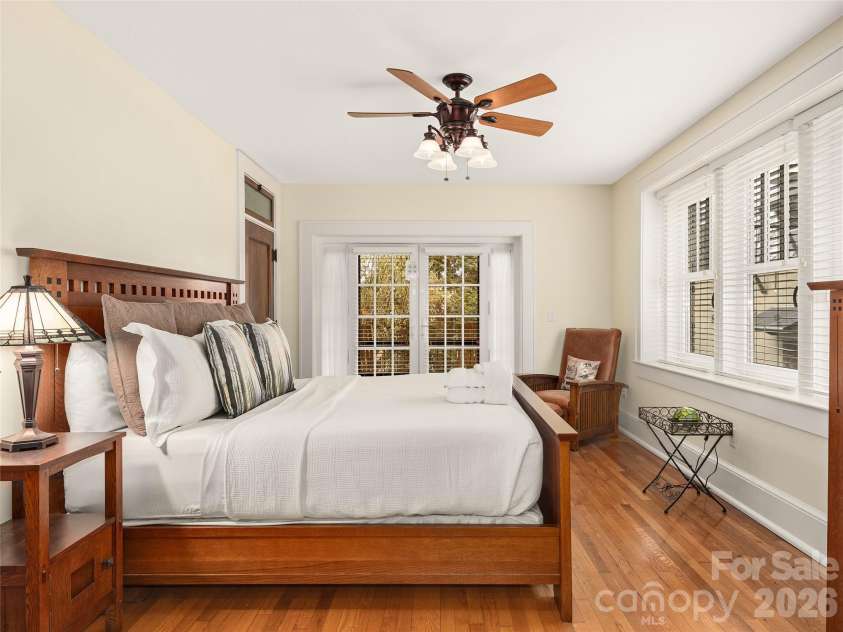 203 6th Avenue, Hendersonville, NC 28739.  MLS# CAR4288242, YatesRealty ID 846. Primary bedroom suite. The attention to detail and architecture in this is what truly warms the space and the peace and quiet and money put into the noise reduction, yet being so close!