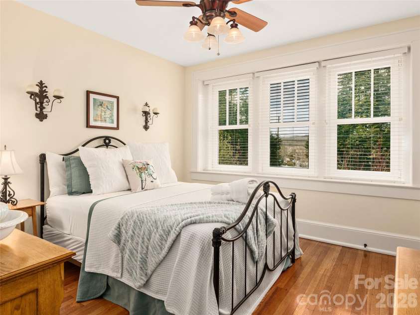 203 6th Avenue, Hendersonville, NC 28739.  MLS# CAR4288242, YatesRealty ID 846. Second bedroom suite. The attention to detail and architecture in this is what truly warms the space and the peace and quiet and money put into the noise reduction, yet being so close!