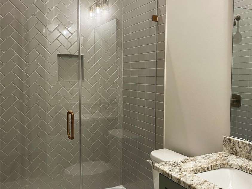 183 Chaska Loop, Troutman, NC 28166.  MLS# CAR4364790, YatesRealty ID 8461. Guest Bath on Main Level