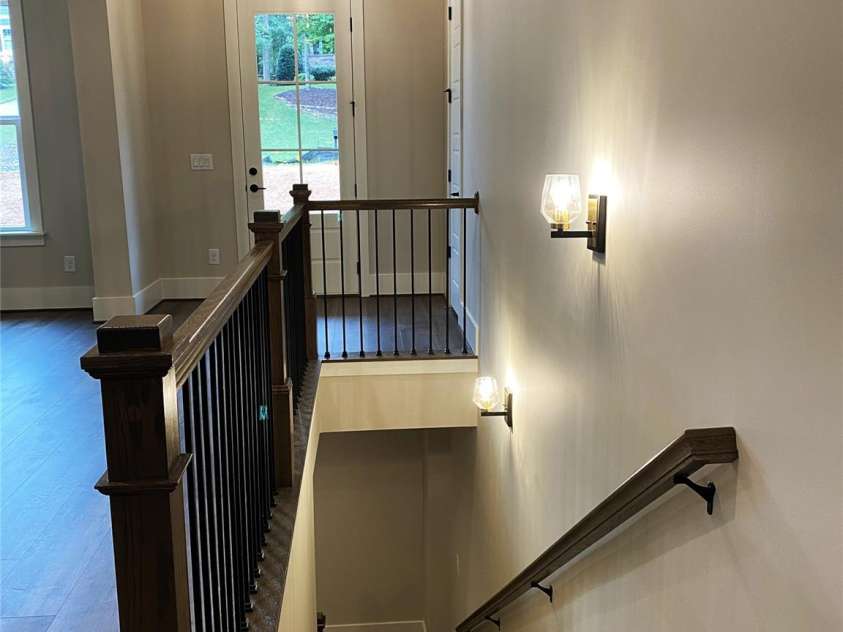 183 Chaska Loop, Troutman, NC 28166.  MLS# CAR4364790, YatesRealty ID 8461. Steps to Terrance Level
