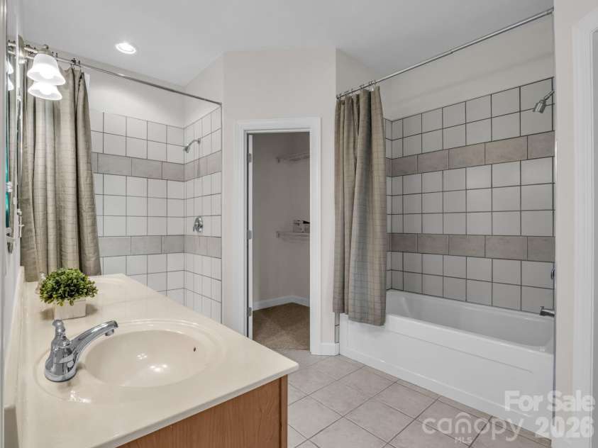 7 Saint Andrews Road, Arden, NC 28704.  MLS# CAR4304401, YatesRealty ID 8462. Primary Bath with Double Vanity