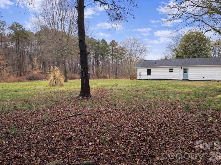 112 Harmony Trail, Gastonia, NC 28056.  MLS# CAR4350947, YatesRealty ID 8467. Expansive .62 acre backyard offering privacy and space to enjoy