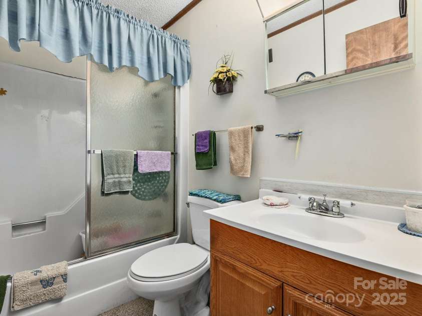 520 Loop Road, Hendersonville, NC 28792.  MLS# CAR4234543, YatesRealty ID 8469. 