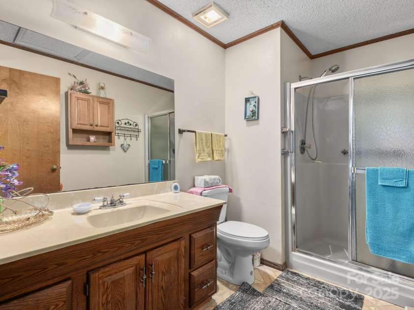 520 Loop Road, Hendersonville, NC 28792.  MLS# CAR4234543, YatesRealty ID 8469. 