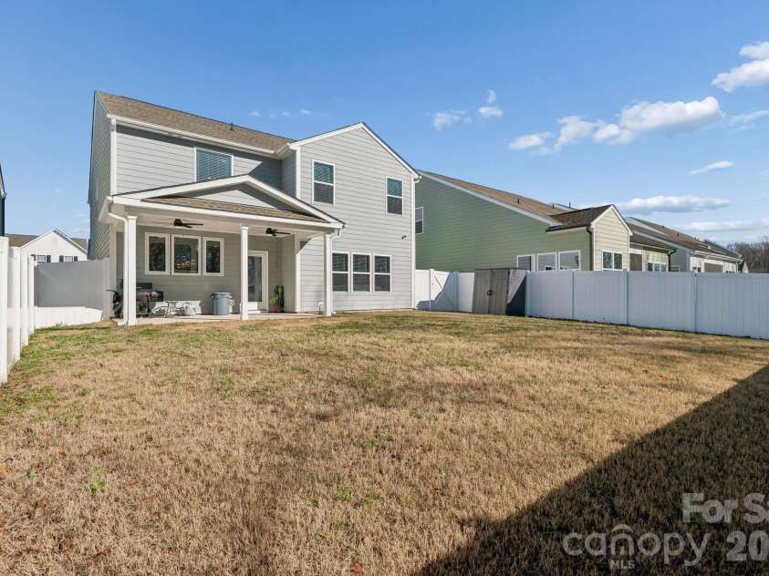 164 Aspire Circle, Wingate, NC 28174.  MLS# CAR4357639, YatesRealty ID 8472. Fenced backyard w/ covered patio