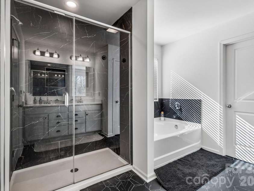 164 Aspire Circle, Wingate, NC 28174.  MLS# CAR4357639, YatesRealty ID 8472. Primary Bathroom w/ separate shower & tub