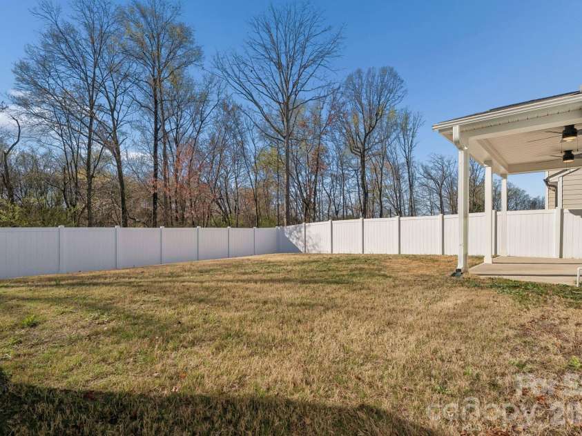 164 Aspire Circle, Wingate, NC 28174.  MLS# CAR4357639, YatesRealty ID 8472. Privacy backyard with treelike and fenced