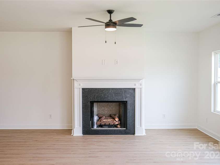 3035 Swallowtail Lane, Kannapolis, NC 28083.  MLS# CAR4188580, YatesRealty ID 8473. Fireplace in Living Room