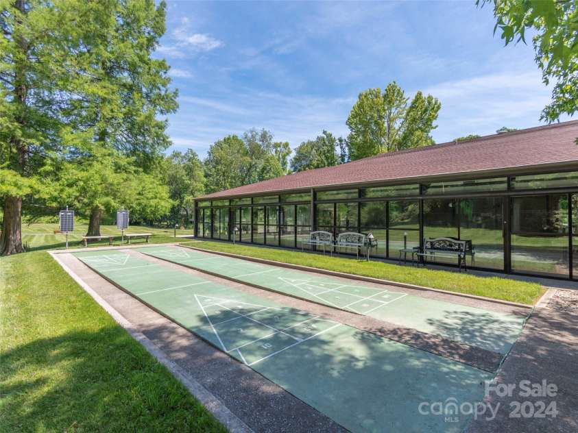 303 White Oak Drive, Hendersonville, NC 28791.  MLS# CAR4186920, YatesRealty ID 8475. Shuffleboard anyone