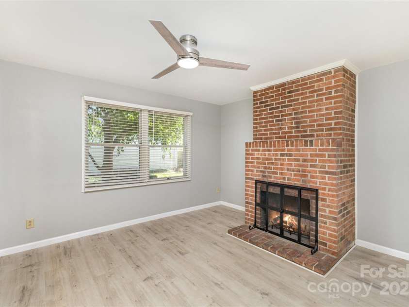 7507 Holly Grove Court, Charlotte, NC 28227.  MLS# CAR4246901, YatesRealty ID 8480. *Fire is virtual and does not represent the condition of fireplace.