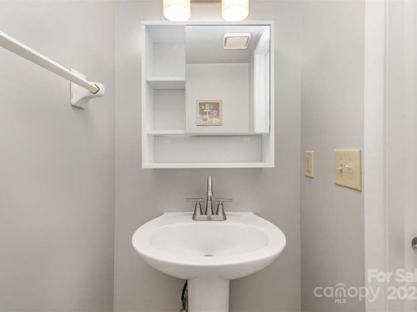 7507 Holly Grove Court, Charlotte, NC 28227.  MLS# CAR4246901, YatesRealty ID 8480. Half Bath - Upstairs