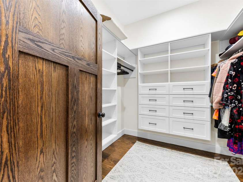 13124 Lemmond Drive, Matthews, NC 28105.  MLS# CAR4228308, YatesRealty ID 8482. Primary bedroom walk-in closet