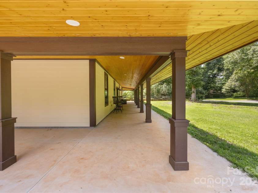 13124 Lemmond Drive, Matthews, NC 28105.  MLS# CAR4228308, YatesRealty ID 8482. Wraparound porch