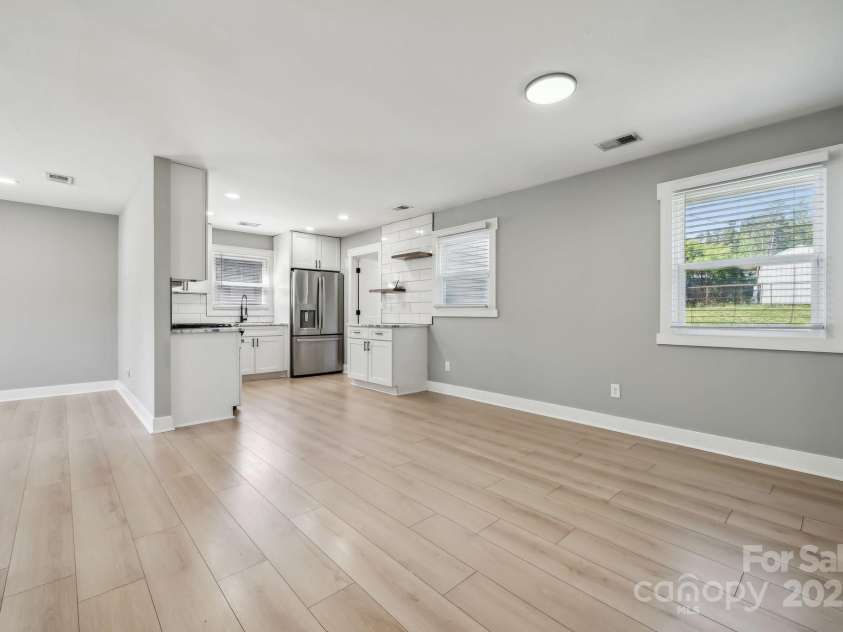 500 Dedmon Drive, Charlotte, NC 28216.  MLS# CAR4247974, YatesRealty ID 8486. Dining Area to Kitchen