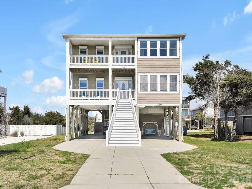 1018 Dolphin Drive, Oak Island, NC 28465.  MLS# CAR4355087, YatesRealty ID 8487. 